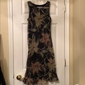 Black mid length print dress with sparkle detail